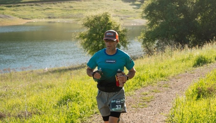 How should a person replace electrolytes and fluids during endurance efforts?