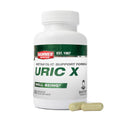 A white plastic bottle of Hammer Nutrition Uric X Metabolic Support Formula with two light green capsules placed in front on a white background.